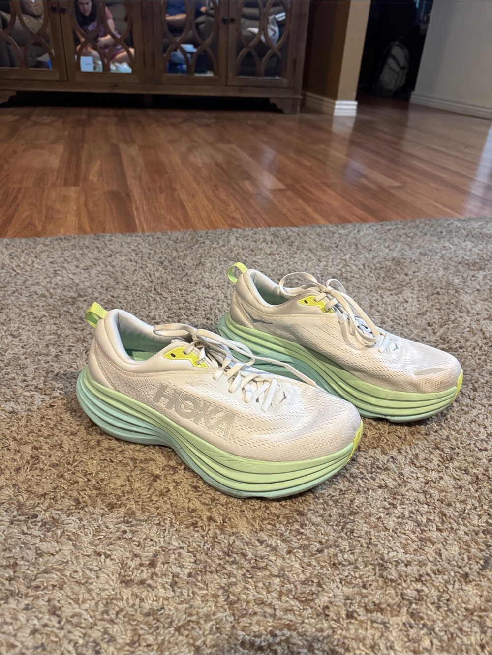 Hoka Bondi 8 White Sneakers with Mint Green Soles and Yellow Accents